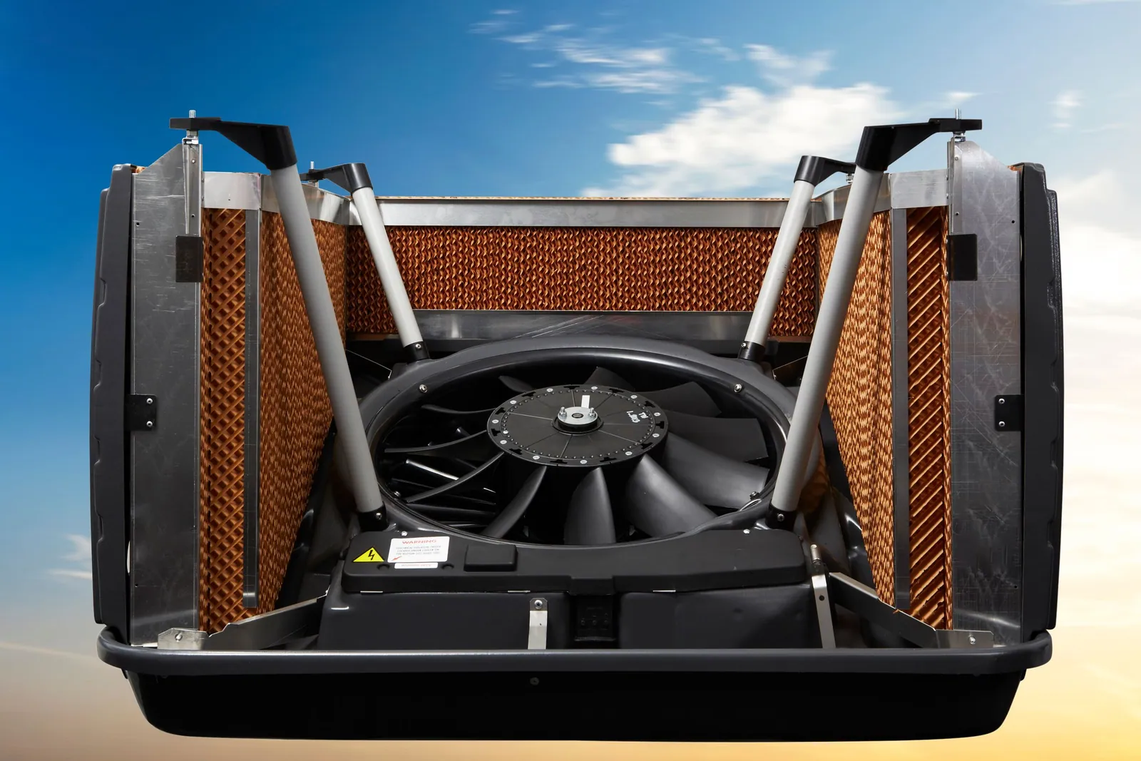 Brivis Contour evaporative cooler with the cabinet open, showing the fan, the pump and the four cooling pads